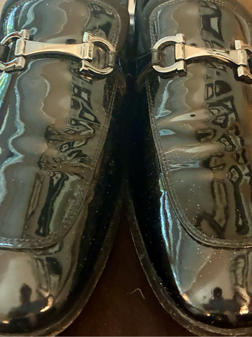 Salvatore Ferragamo Black Patent Leather Loafers with Silver Horse Bit.